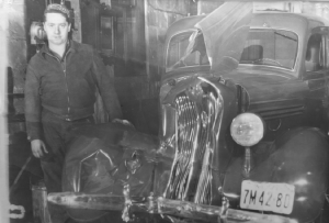 Picture of Ray Kerhaert senior working in auto repair shop-Greece NY