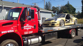 Flatbed loaded with expensive race car in Greece NY
