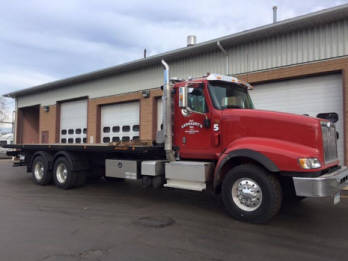 Our brand new heavy duty flatbed for all towing and hauling in Rochester NY