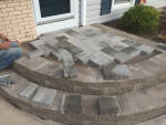 Paverstone steps being placed for customer. Installed by Aaron of Landscape Solutions. Rochester NY. 14616

585-342-5296