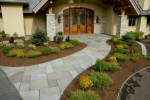 hardscaped walkway leading to front door.