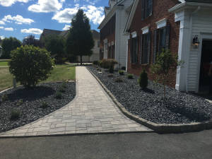 Landscaping and sidewalk.

Installed by Aaron of Landscape Solutions. Rochester NY. 14616

585-342-5296